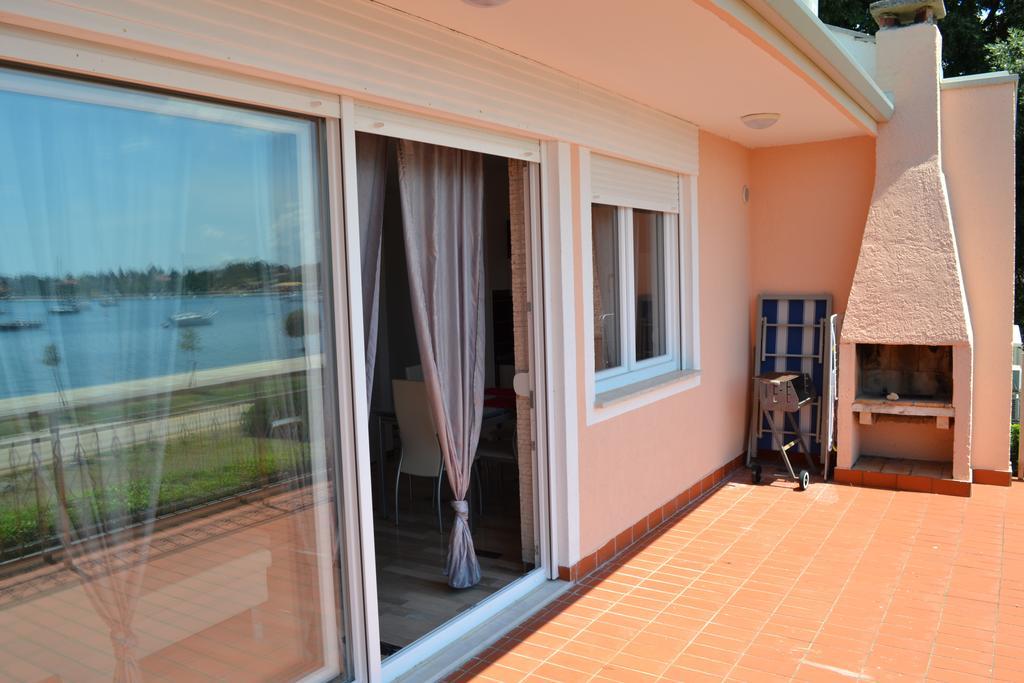Apartments Lungomare Умаг Стая снимка